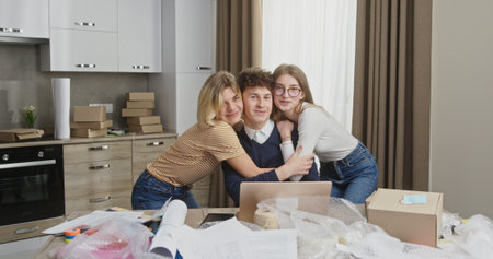 Online Store Team Celebrating First Sale in Home Office