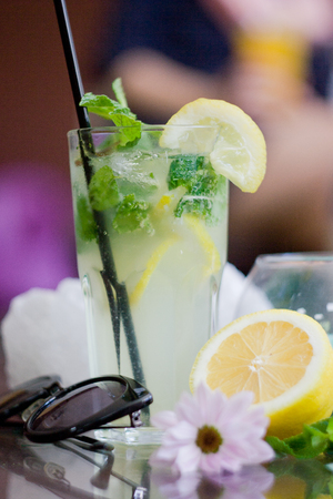 Mojito cocktail with lemon on table.の写真素材