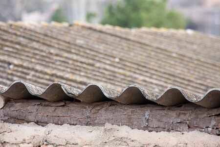 a view of a traditional fibre cement roof of a spanish town houseの写真素材