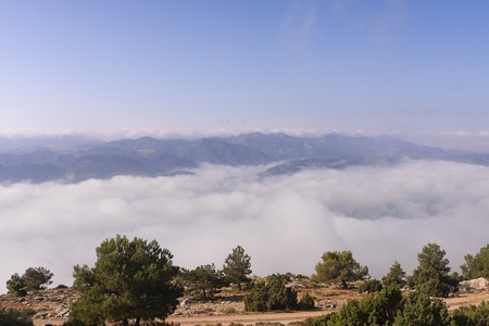At the top of a mountain, at sunrise time, there is an ocean of clouds, in nerpio, spainの写真素材