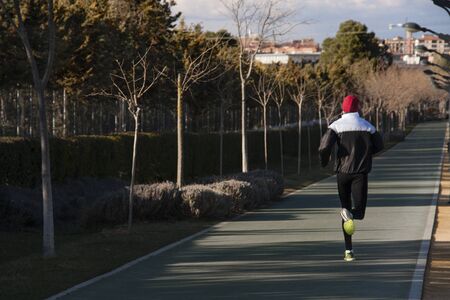 a man running in an urban area