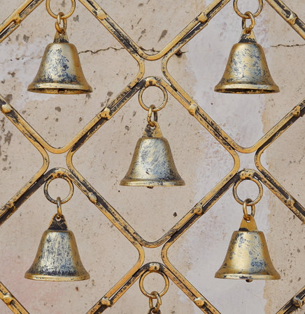Rustic Bells. Iron Decorative Hanging Bells with tarnished brass finish. Home designの写真素材