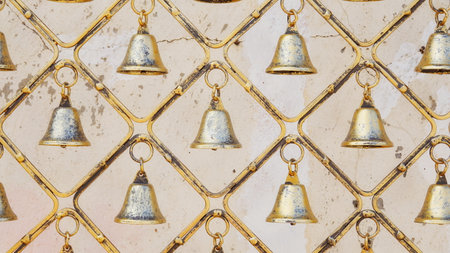 Old Rustic Bells. Iron Decorative Hanging Bells with tarnished brass finish. Home designの写真素材