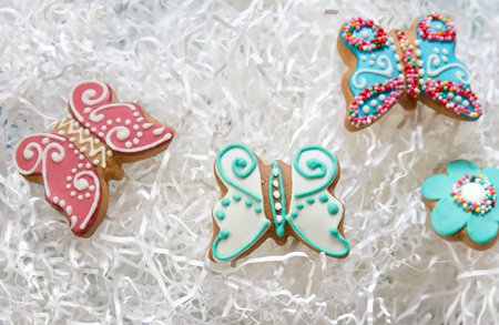Gingerbread cookies butterflies on white background. Easter Conception.の写真素材