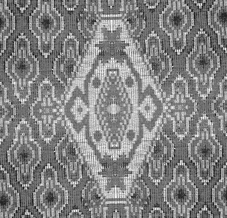 An attractive vintage wallpaper showcases a carpet pattern with ornament