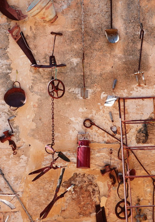 Beautiful wall decoration with old rusty objects. Vintage backgroundの写真素材