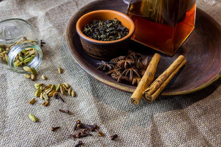 Hot tea for relaxing mood with star anise, cinnamon and cardamon.の写真素材