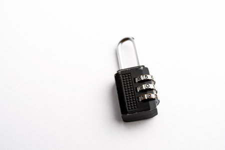 Padlock with a pin code isolated on white backgroundの写真素材
