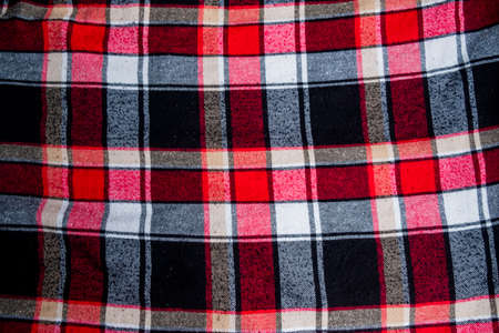 Red and black buffalo plaid pattern. Lumberjack background. Classic red Scottish gingham pattern texture.の写真素材