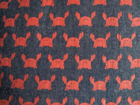 Baby blanket red crab pattern. Bedspread with Dark color.の写真素材