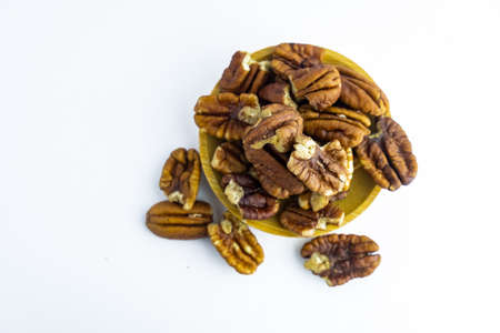 Pecan nuts isolated on white background.の写真素材