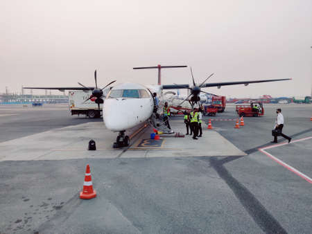 16 November, 2021 IGI Terminal 2, Delhi, India. The plane is on the platform preparing for the next flight at IGI Terminal 2, Delhi, Airportのeditorial素材