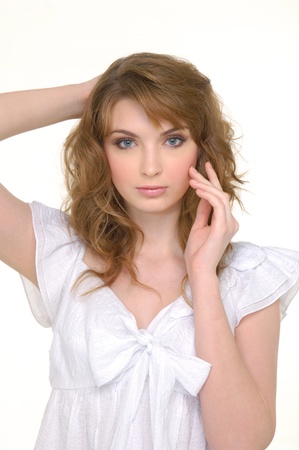 Beautiful young woman face, Isolated over whiteの写真素材