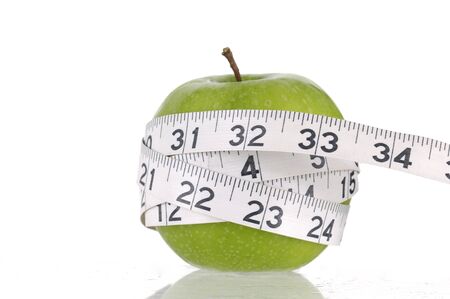 Green apples measured the meter, sports applesの写真素材