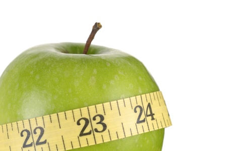 Close up green apples measured the meterの写真素材