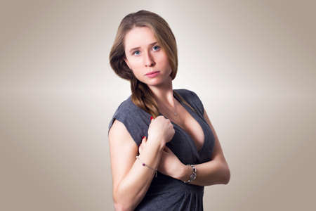 Sensuality beautiful blonde hair and blue eyes woman with fashion and elegant dressの写真素材