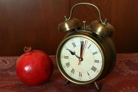 Vintage metal alarm clock in a retro interiorの写真素材