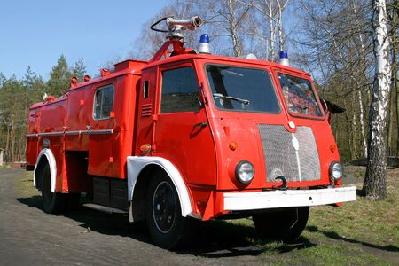 Vintage fire fighting brigade . Old firefighting equipment.