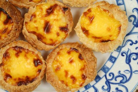 Portugese pastries - pasteis de nata. Delicious home made cuisine. Typical for Lisbon region.