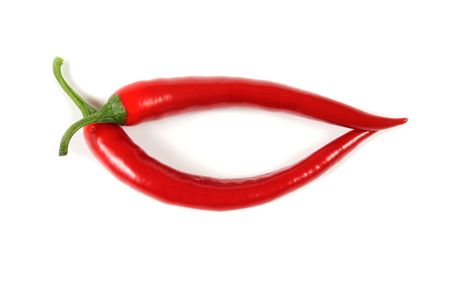 Red, fresh cayenne peppers. Vegetables isolated on white.の写真素材