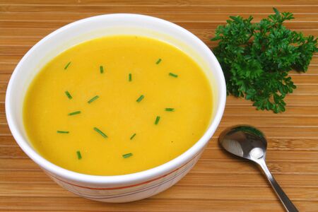 Pumpkin soup on wooden background. Polish cuisine.の写真素材