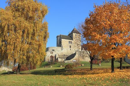 Gothic knight castle ruins in Poland - Bedzin fortifications and autumn park. Old landmark.のeditorial素材