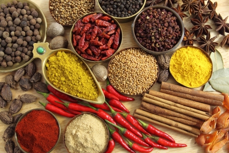 Spices and herbs in metal  bowls. Food and cuisine ingredients. Colorful natural additives.の写真素材