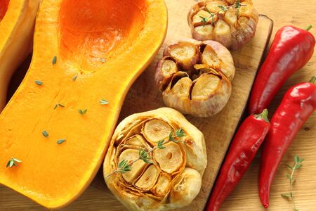 Baked pumpkin with garlic, olive oil and thyme. の写真素材
