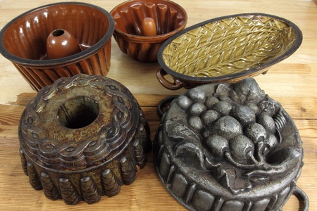 Old traditional  baking pans and moulds for cakeの写真素材