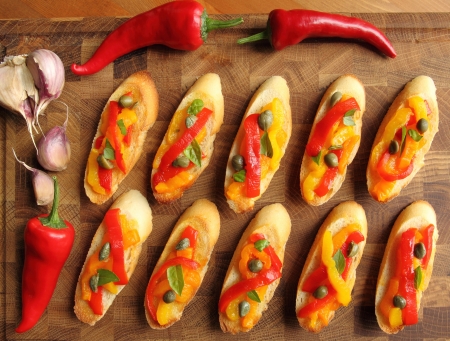 Crostini, small toasts with colored peppers and spices.の写真素材