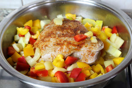 Roast turkey with spices, peppers and zucchiniの写真素材