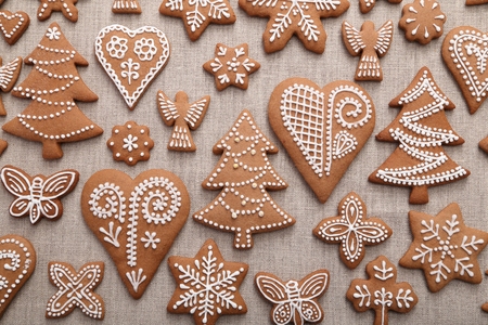 Christmas homemade gingerbread cookies on linen canvas.の写真素材