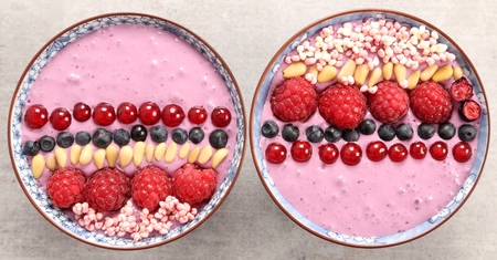 Blueberry smoothie bowl with raspberries, currants, pine nuts, blueberries, millet gruel.の写真素材