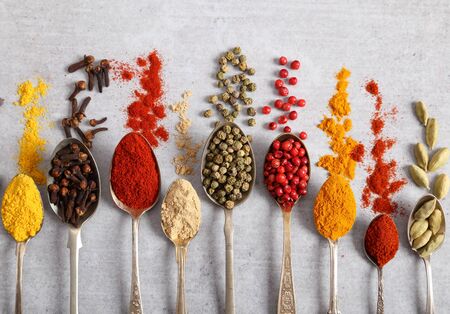 Aromatic spices on spoons. Top view, flat lay.の写真素材