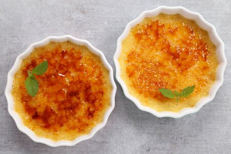 Creme brulee - traditional french vanilla cream dessert with caramelised sugar on top.
