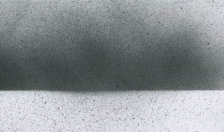 Very hight resolution. Wallpaper with airbrush effect. Black acrylic paint stroke texture on white paper. Scattered mud art. Macro image. Hand made grunge.の写真素材