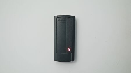 Lublin, Poland - November 2017: Close up of a woman using a modern intercom at a residential building entrance.のeditorial素材