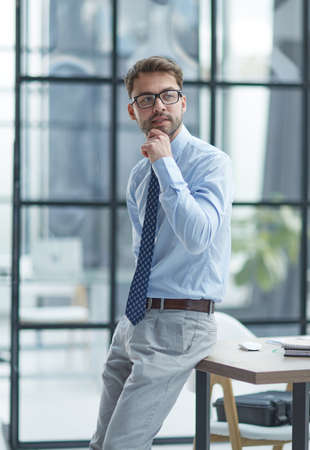 Young businessman working at officeの写真素材