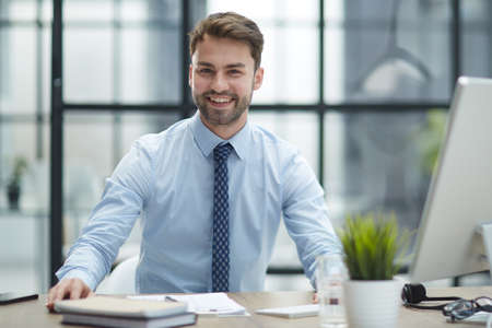 Young businessman working at officeの写真素材