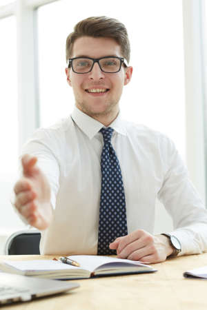 Businessman extending hand to shakeの写真素材