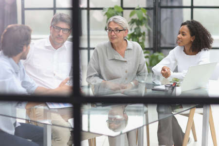 discussion of successful business people in the officeの写真素材