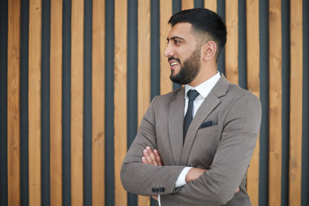 Portrait of successful young businessman in office