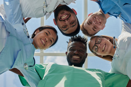 Portrait of a group of happy doctors and nurses in hospitalの写真素材