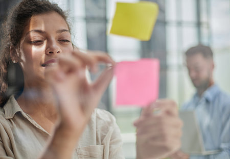 Bringing her vision to life. Shot of a confident businesswoman presenting an idea to her colleague...