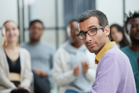 Portrait of a successful young professional businessman sittingの写真素材