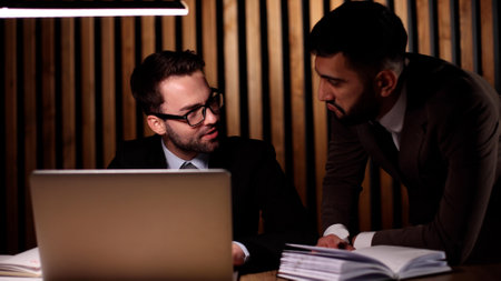 Young business male meeting with a colleague in office at workの写真素材