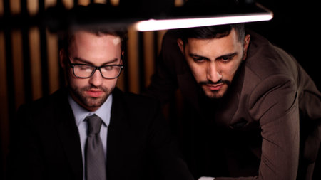 Young business male meeting with a colleague in office at workの写真素材