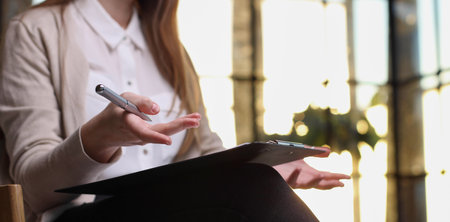 woman fill in information in questionnaire making application for hire on vacancy