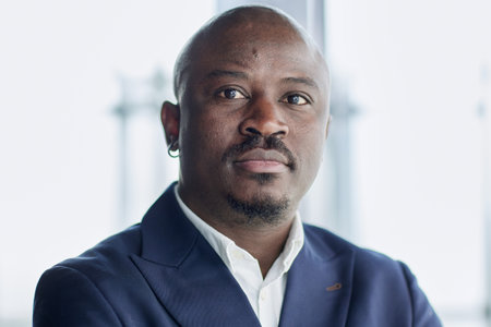 Handsome african american executive businessman in modern office