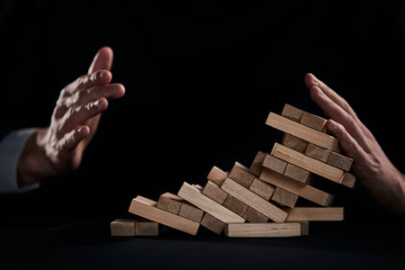 Plan and strategy in business, Risk To Make Business Growth Concept With Wooden Blocks, hand of man...